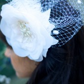 Melina Dramatic Bridal flower, Birdcage veil and feathers fascinator
