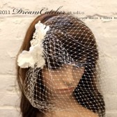 Rosette Birdcage veil w/ silk ivory flower and crystal vintage accent brooch