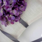 White Burlap Ring Pillow With Ribbon and Magnolia