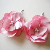 http://www.etsy.com/listing/82242126/coral-pink-salmon-tea-rose-satin-hair
