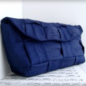 Navy blue woven clutch