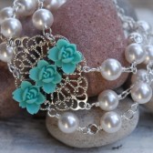 Triple Strand Pearl Bracelet with Aqua Flower