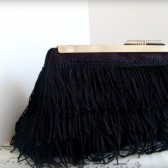 Black fringe clutch