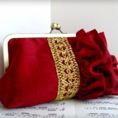 Dark red silk ruffled clutch