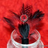 Red and Black Feather Boutonniere with Miniature Bottle Cap Monogram