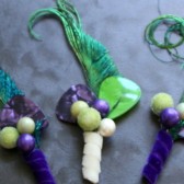 Purple Pick and Peacock Boutonniere