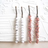 http://www.etsy.com/listing/88656019/white-pearl-or-blushing-pink-beaded?ref=v1_other_1