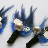 Black and Blue Feathered Gear and Sprocket Boutonniere