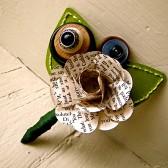 Green, and book page boutonniere