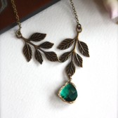 An Emerald Green Glass Jewel, Oxidized Brass Leaves Necklace