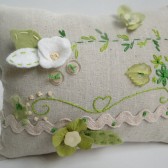 hand embroidered ring pillow in green 