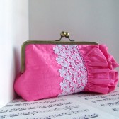 Pink asymmetrical ruffle clutch
