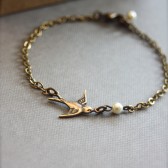 A Tiny Oxidized Brass Flying Swallow Bird with Swarovski Ivory Pearl Bracelet