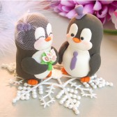 Penguin cake topper with snowflake base