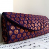Navy and copper brocade clutch