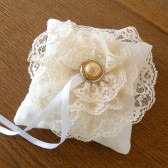 Cream cotton wedding ring pillow with lace flower