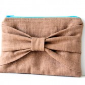brown linen bow pouch