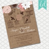 Pink Bird Cage Wedding Invitation on Brown Linen