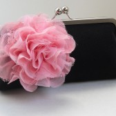 Black clutch with pink blossom pin 