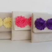 Set of 3 bridesmaids clutches in rustic burlap with fabric flowers 