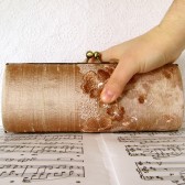 Champagne minaudiere silk clutch with chain