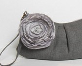gray clutch with lagre fabric flower 