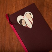 Wedding Program with cartoon images of bride and groom