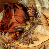 chocolate rose fall woodland boutonniere