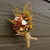 country wedding boutonniere with sweet annie and rosebuds