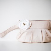 Gathered clutch in cream and champagne
