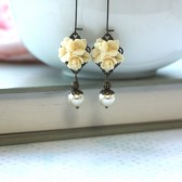 Ivory Star Flower Bouquet Bloom Ivory Pearl Antiqued Brass Dangle Earrings.