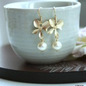 https://www.etsy.com/listing/100806673/a-golden-orchid-flower-ivory-pearl-drop?ref=shop_home_active