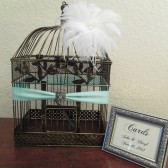 Birdcage Card Holder with white feathers and framed card sign