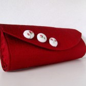 Red silk clutch with buttons