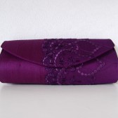 Purple silk and lace clutch
