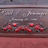 carved wedding sign with roses