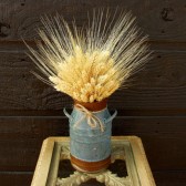 wheat in vintage milk container