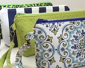 wristlet clutch  in apple green and navy marine 
