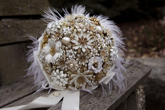 This winter white bouquet features vintage brooches I love me some vintage