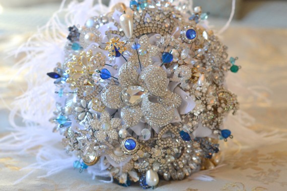 Wowza look how many vintage brooches are packed into this bouquet and check