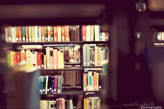 couple kissing in library kissing in the library