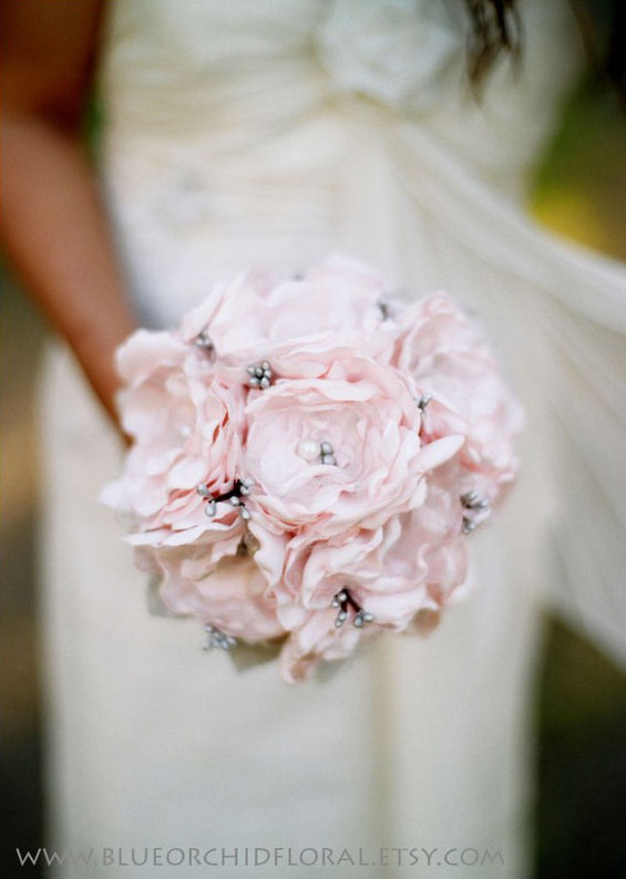 I spotted this pretty shell pink bridal bouquet via Blue Orchid Floral made