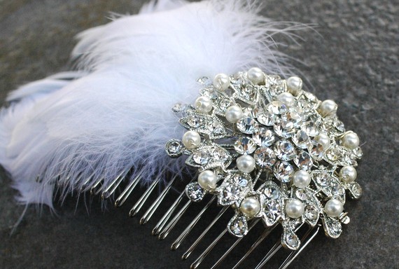 A hair comb is one of our favorite bridal veil alternatives and this feather