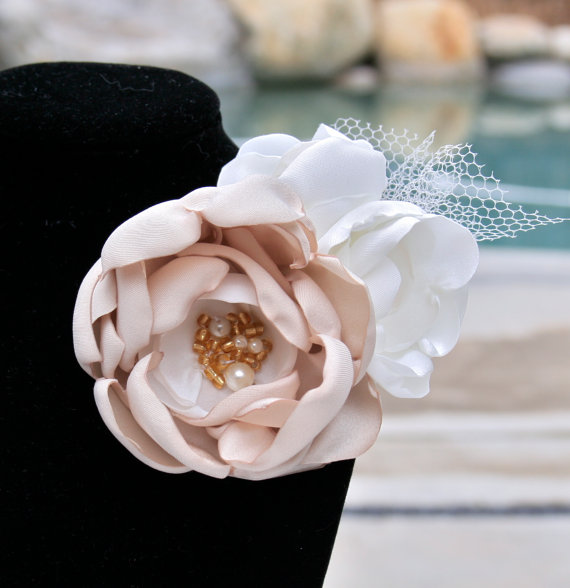 This one in particular the champagne bridal brooch is our favorite and is