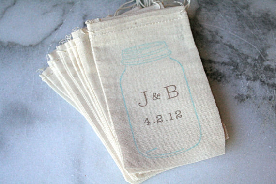 Muslin bags feature a drawstring and mason jar stamp in robin's egg blue