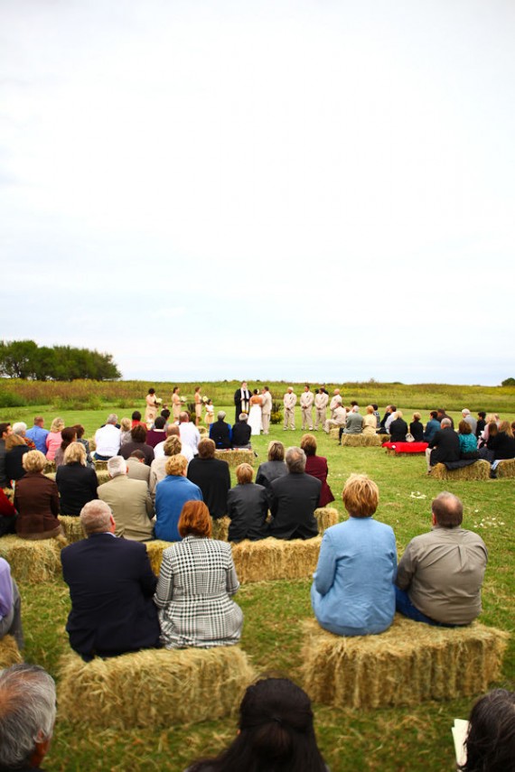 I think the hay bales add to this beautiful ceremony's site and ethereal 
