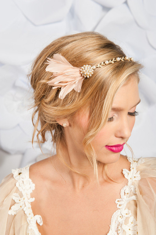 blush pink set on a gold headband with a pearl rhinestone and gold 