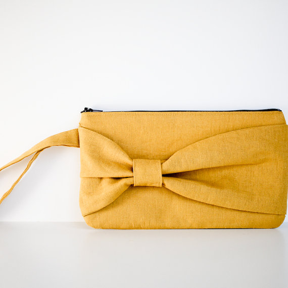 We especially love this mustard yellow clutch purse shown below take a 