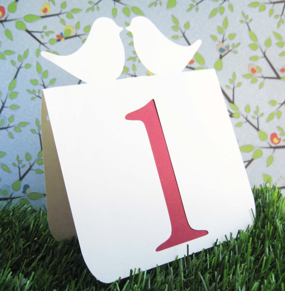 These love birds chair signs are a must for the bride and groom