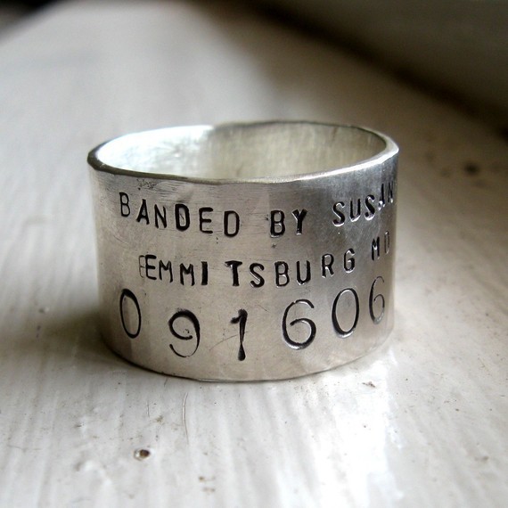 Made to look like a duck band this brilliant bird band wedding ring by 